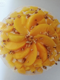 Una foto de Pastel de tres leches de durazno y nuez