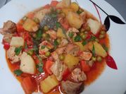 Una foto de guiso patatas con rosada
