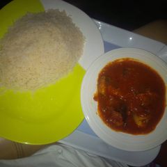 A picture of Fish stew and rice.