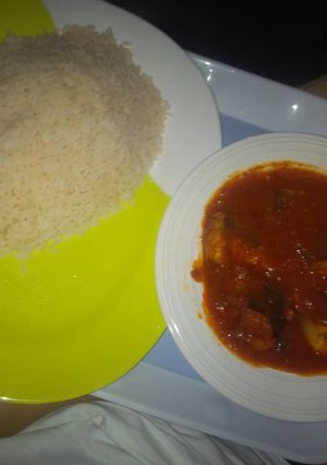 A picture of Fish stew and rice.