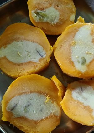A picture of Ice cream loaded mango.