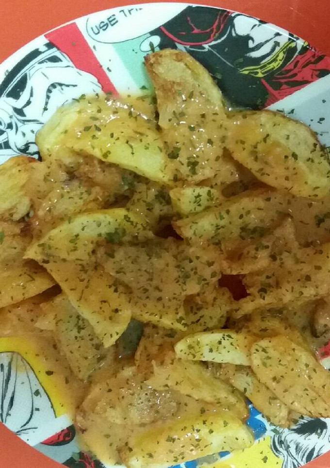 Una foto de Papas a la bravas