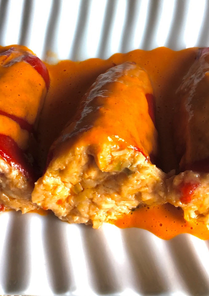 Una foto de Pimientos rellenos de salmón, merluza y langostinos