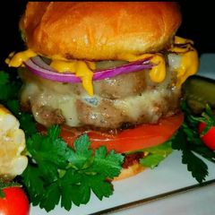 A picture of Mike's Garlic Juicy [aka Jucy] Lucy Hamburgers.