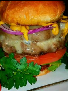 A picture of Mike's Garlic Juicy [aka Jucy] Lucy Hamburgers.
