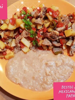 Una foto de Bistec ala mexicana con papas