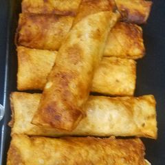 A picture of Chicken & veges rolls.