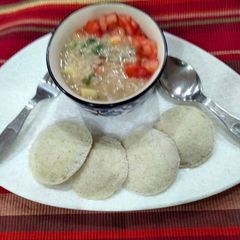 A picture of Oats and vegetable soup.