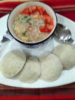 A picture of Oats and vegetable soup.
