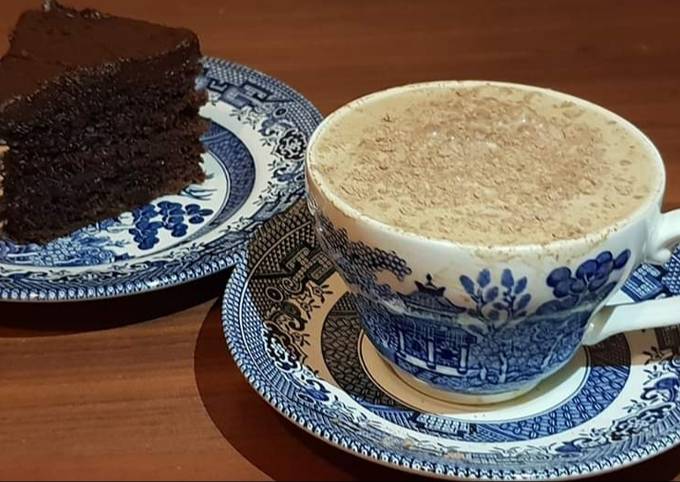 Chocolate fudge cake with a cup of coffee