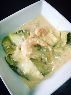 A picture of Camarones con calabacitas y leche de coco.