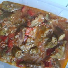 A picture of Okra with peppers.