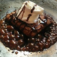 A picture of Eggless Sizzaling Brownie on Tava(Without Sizzler Plate).