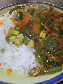 A picture of Chicken on Vegetable sauce with egg!.