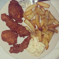 A picture of Seasoned chicken strips.