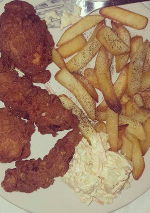 A picture of Seasoned chicken strips.