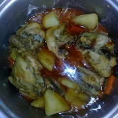 A picture of Chicken stew with potatoes.
