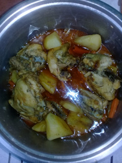 A picture of Chicken stew with potatoes.
