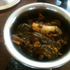A picture of Gongura mamsam or lamb cooked with sorrel leaves.