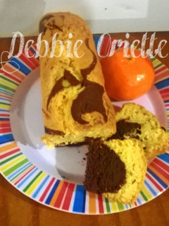 Una foto de Budín de Mandarina 🍊 Marmolado (Mi versión) súper Económicos)