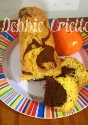 Una foto de Budín de Mandarina 🍊 Marmolado (Mi versión) súper Económicos)