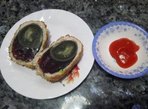 Hình của món Trứng bắc thảo bọc thịt chiên xù.