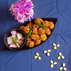 A picture of Onions sweet corn pakoda (bhajiya).