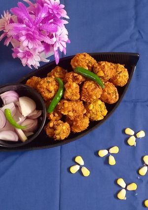 A picture of Onions sweet corn pakoda (bhajiya).