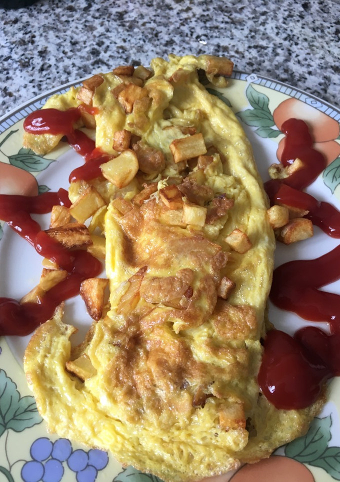 Una foto de Tortilla con patatas fritas