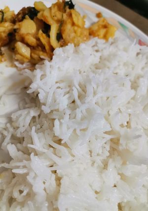 A picture of Potatoes fry with rice.