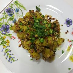 A picture of Peanut with potato sabzi.