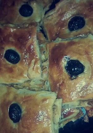 صورة لوصفة كوكا بالبصل وطماطم