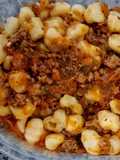 Ñoquis con tuco de carne