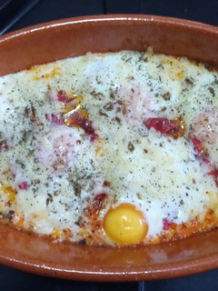 Una foto de Huevos al plato, a la italiana