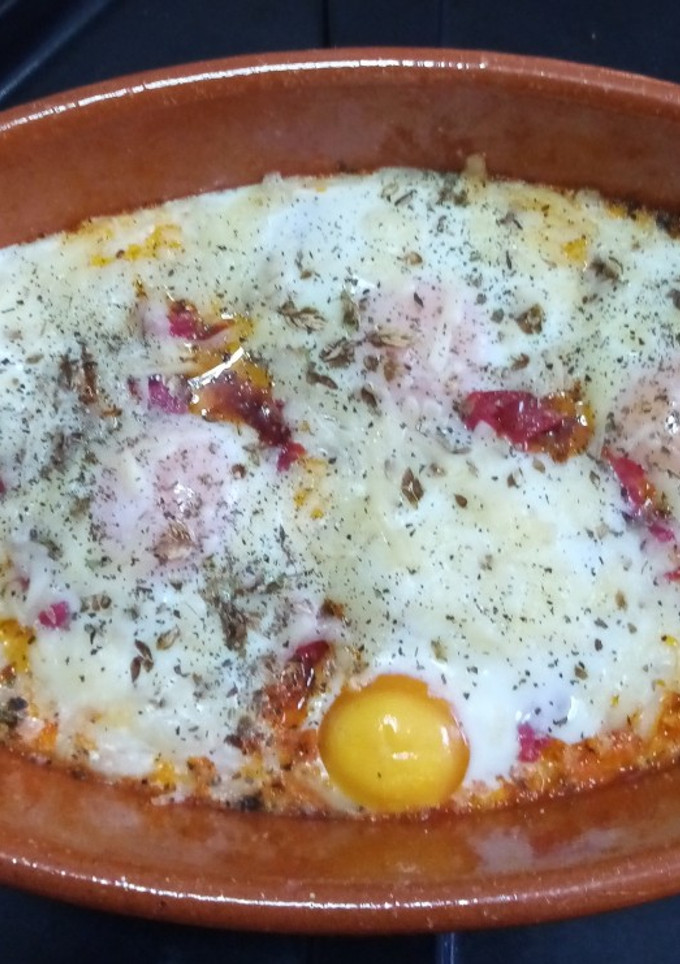 Una foto de Huevos al plato, a la italiana