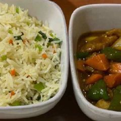 A picture of Chinese rice with boneless chicken.