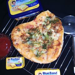 A picture of Heart shape pizza.