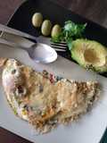 Fried eggs with cheese and avocado
