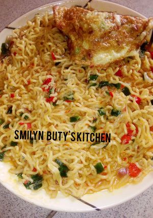 A picture of Indomie with veggies.