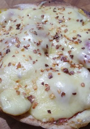 Una foto de Pizzeta en pan árabe o pan pita