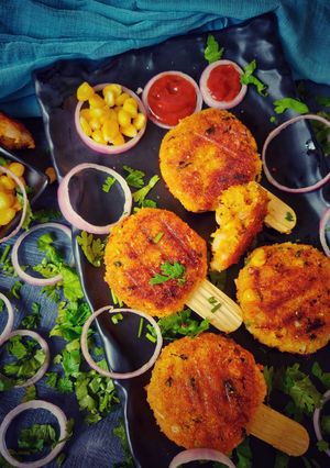 A picture of Alu corn kabab.