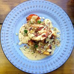 Grilled fruits with light custard and crushed nuts A picture of Grilled fruits with light custard and crushed nuts.