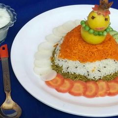 Tirangi biryani with curd A picture of Tirangi biryani with curd.