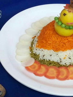 A picture of Tirangi biryani with curd.