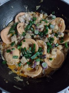 Una foto de Sorrentinos 4 quesos con salsa de pescado