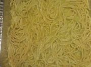 Una foto de espaguetti en chile poblano
