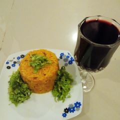 A picture of Rice/beans with salad.