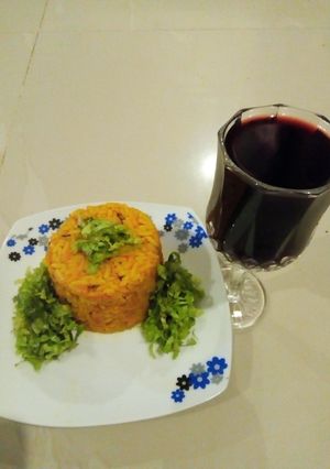 A picture of Rice/beans with salad.