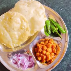 Masala Chole bhature (Baisakhi in Punjab) A picture of Masala Chole bhature (Baisakhi in Punjab).