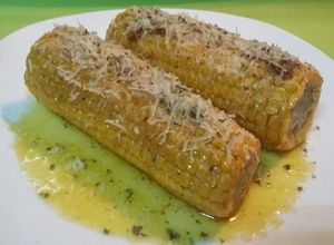 Foto principal de Mazorcas sazonadas a la plancha con Grana padano